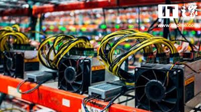 A miner inspecting a new generation of low-noise ASIC miners in a small-scale operation.