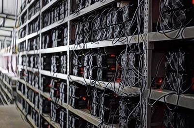 A modern cryptocurrency mining farm, showcasing rows of mining rigs working in harmony